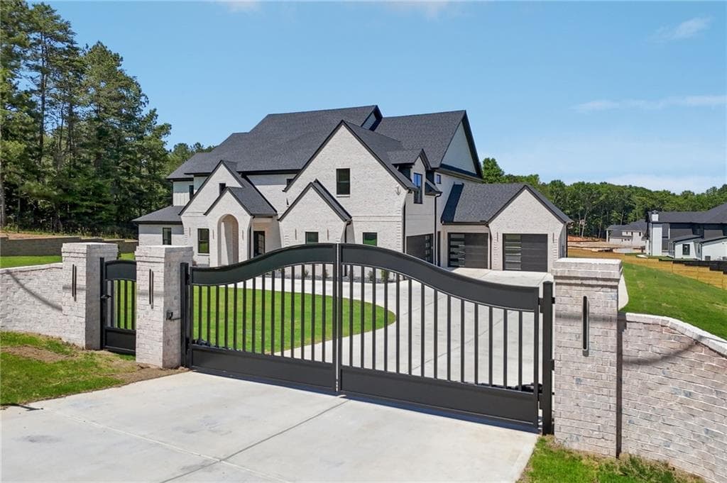 5 bedroom, 6 bathroom, 7,375 sq ft single family residence for sale at 3207 Thompson Mill Rd, Buford, GA 30519 — photo 2
