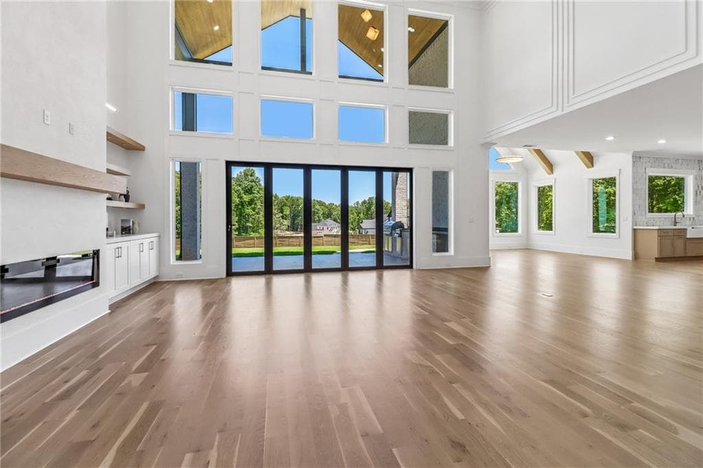5 bedroom, 6 bathroom, 7,375 sq ft single family residence for sale at 3207 Thompson Mill Rd, Buford, GA 30519 — photo 4
