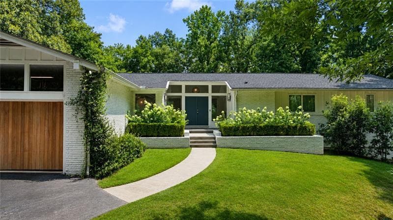 4 bedroom, 3 bathroom, 3,162 sq ft single family residence for sale at 4037 Conway Valley Road, Atlanta, GA 30327 — photo 1 of 36
