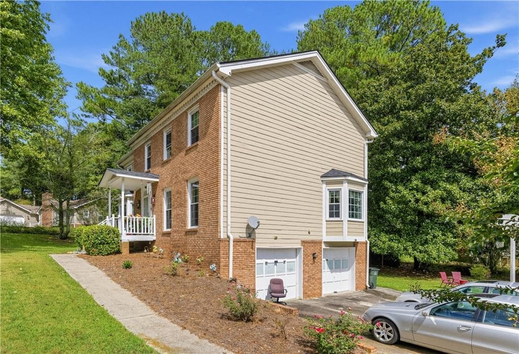 4 bedroom, 3 bathroom, 3,517 sq ft single family residence for sale at 3012 Overwood Lane, Snellville, GA 30078 — photo 2