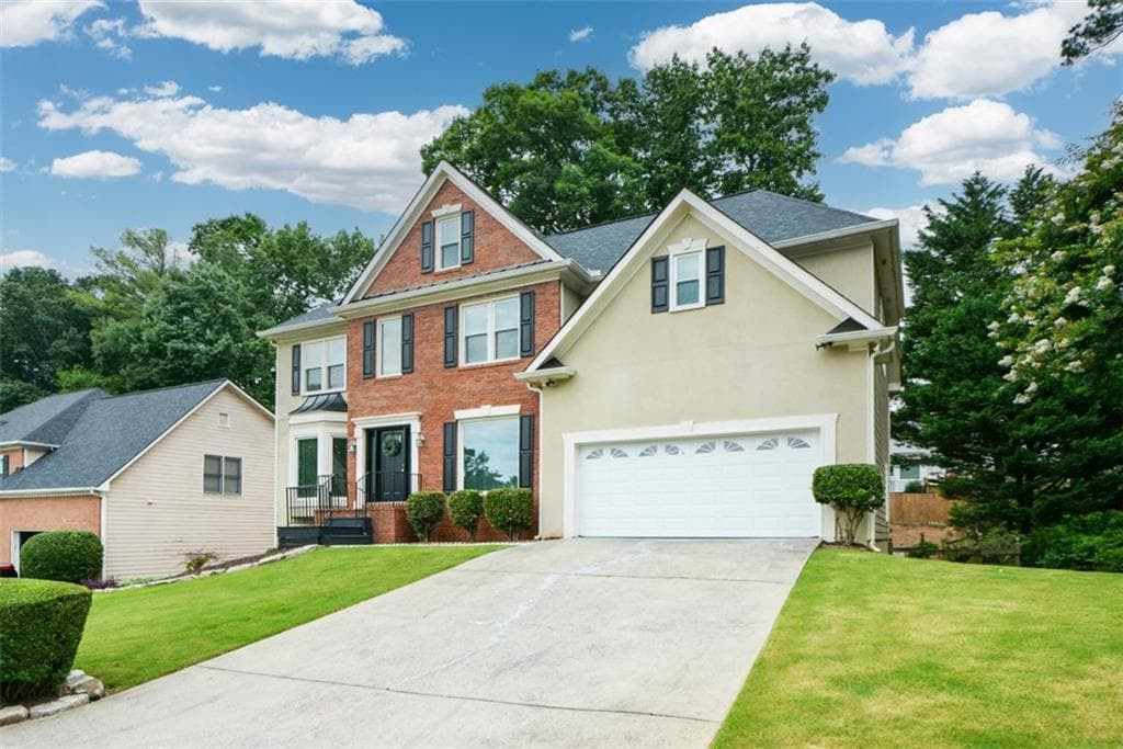 4 bedroom, 5 bathroom, 3,165 sq ft single family residence for sale at 4355 Laurian Drive, Kennesaw, GA 30144 — photo 2