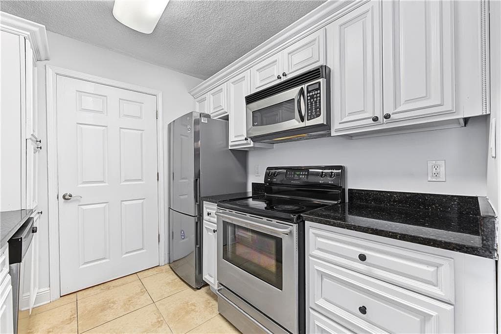 3 bedroom, 2 bathroom, 1,260 sq ft condominium for sale at 6301 Santa Fe Parkway, Sandy Springs, GA 30350 — photo 5