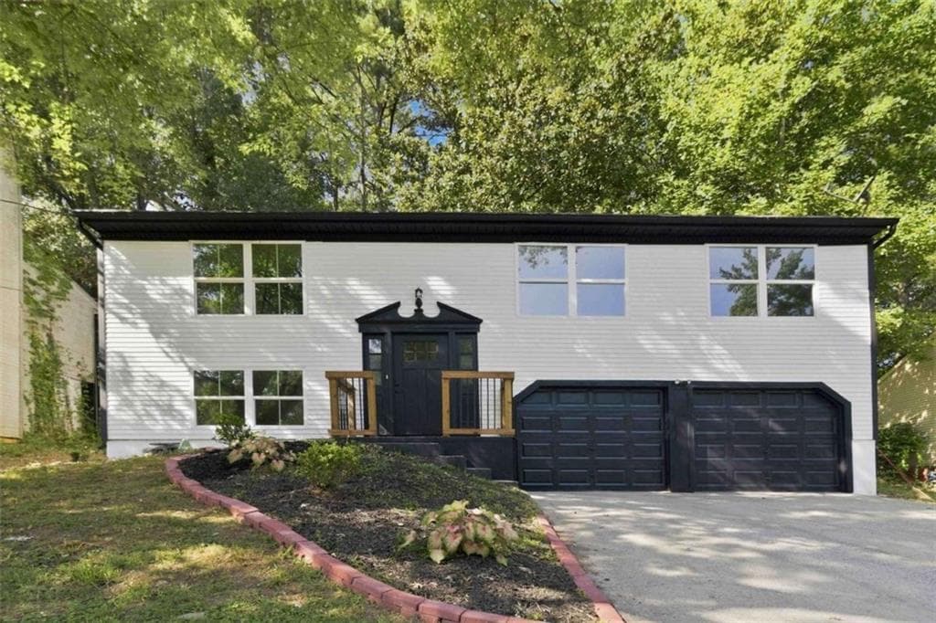 4 bedroom, 2 bathroom, 1,660 sq ft single family residence for sale at 2007 Northerly Way, Stone Mountain, GA 30088 — photo 2
