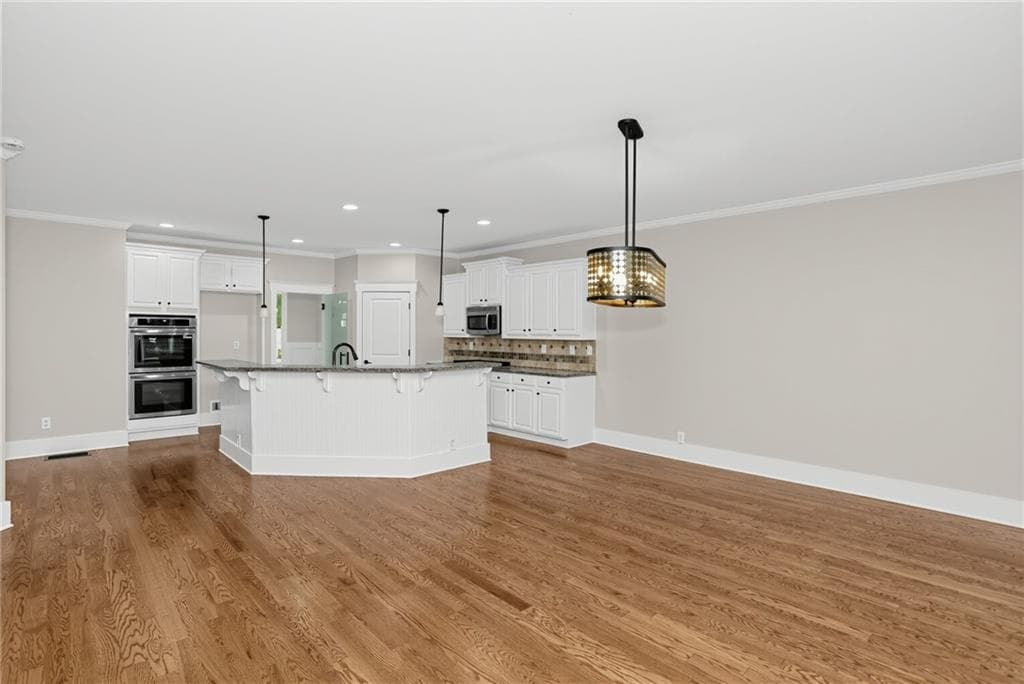 5 bedroom, 3 bathroom, 3,731 sq ft single family residence for sale at 6935 Concord Brook Lane, Cumming, GA 30028 — photo 10