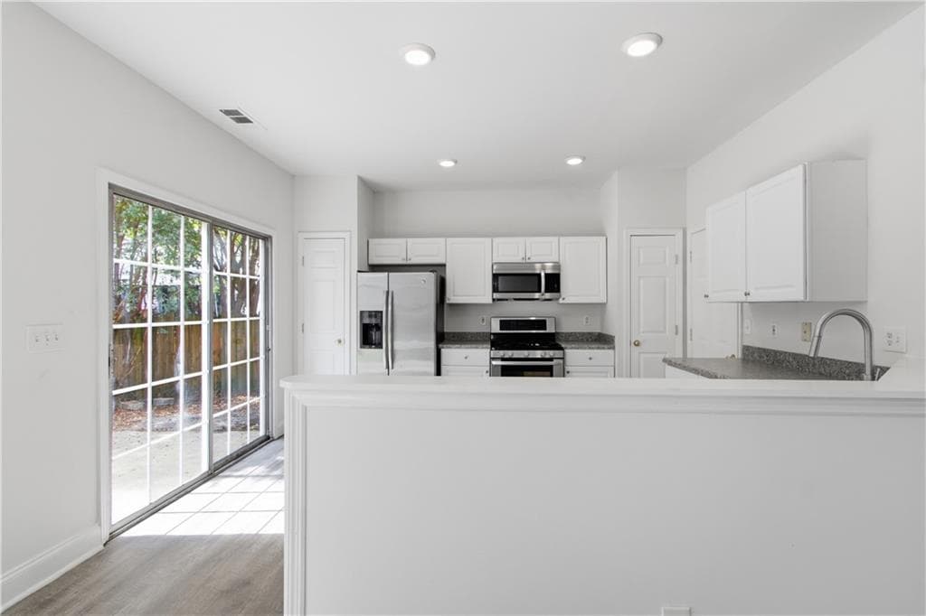 3 bedroom, 3 bathroom, 1,436 sq ft single family residence for sale at 1202 Astastula Way, Woodstock, GA 30188 — photo 7