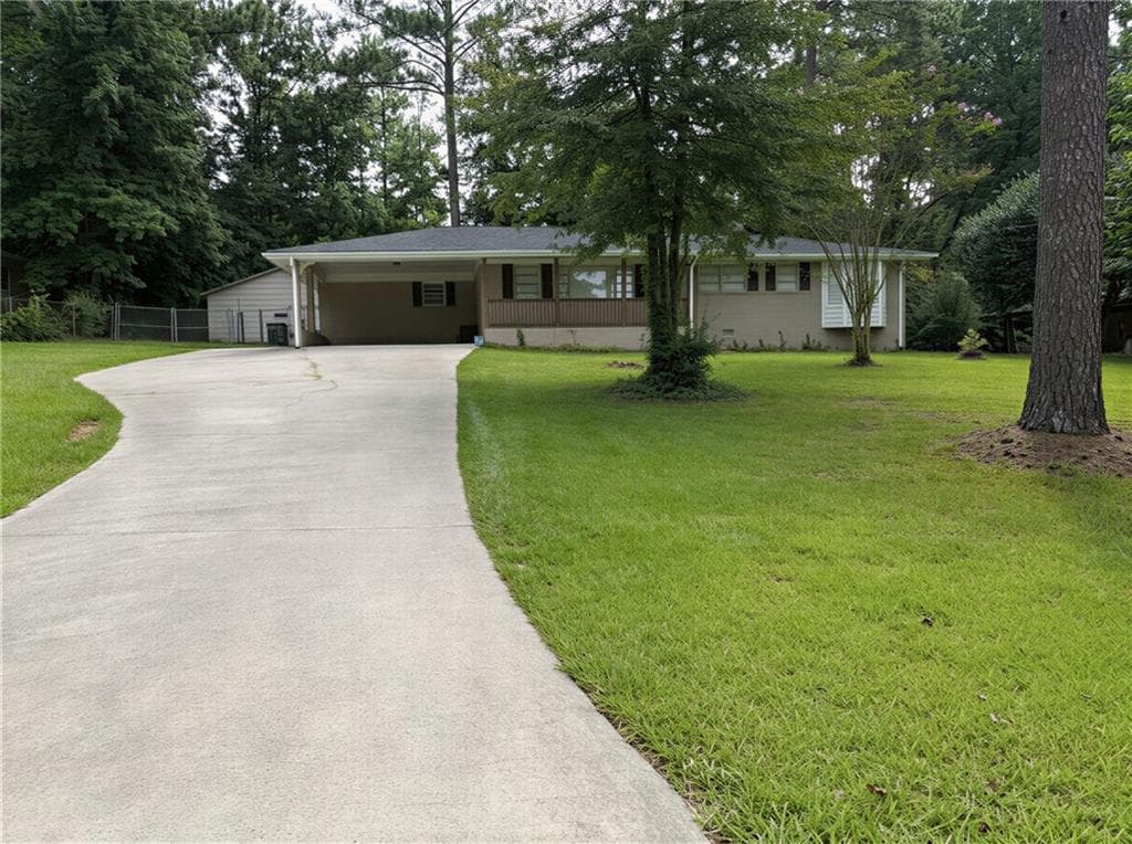 4 bedroom, 2 bathroom, 1,381 sq ft single family residence for sale at 6677 Songwood Drive, Austell, GA 30168 — photo 2