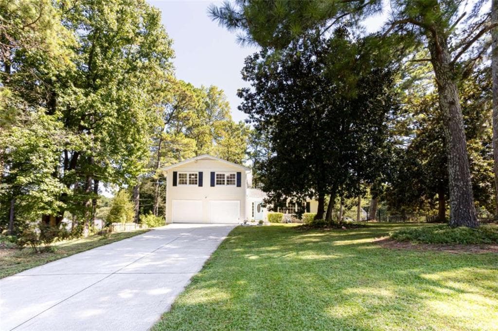 4 bedroom, 3 bathroom, 1,896 sq ft single family residence for sale at 680 Emerald Forest Circle, Lawrenceville, GA 30044
