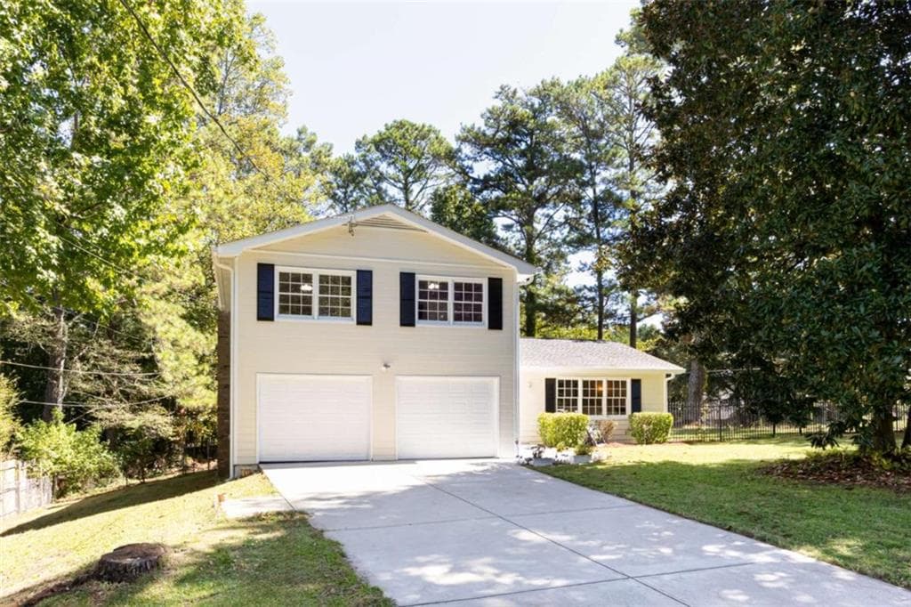 4 bedroom, 3 bathroom, 1,896 sq ft single family residence for sale at 680 Emerald Forest Circle, Lawrenceville, GA 30044 — photo 2
