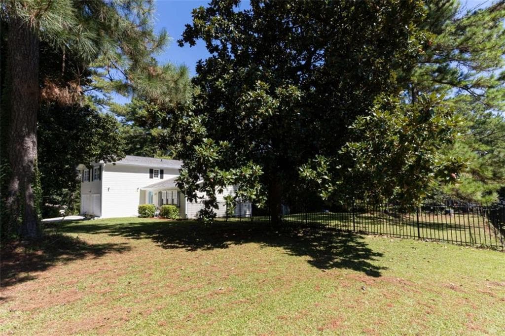 4 bedroom, 3 bathroom, 1,896 sq ft single family residence for sale at 680 Emerald Forest Circle, Lawrenceville, GA 30044 — photo 5