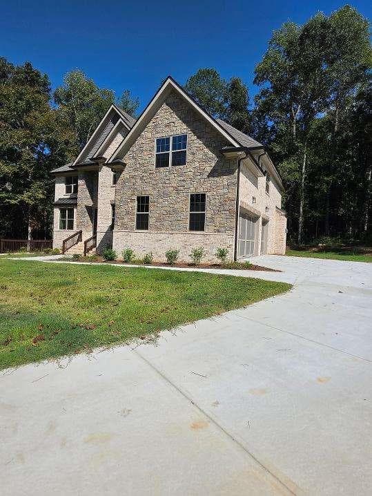 5 bedroom, 5 bathroom, 3,260 sq ft single family residence for sale at 5658 Eternal Drive, South Fulton, GA 30349 — photo 2