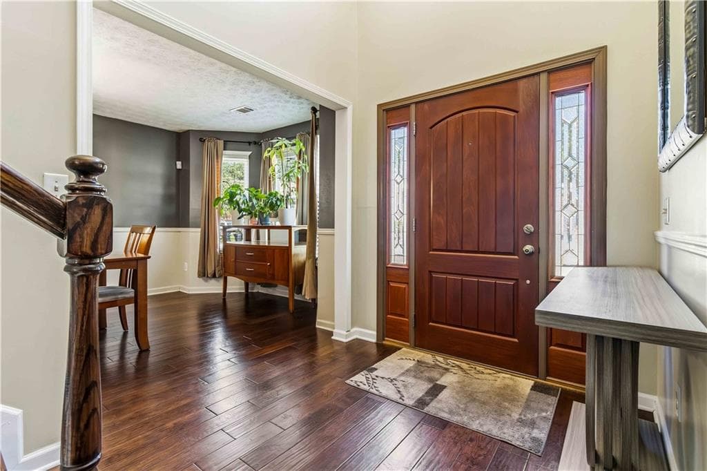 4 bedroom, 3 bathroom, 2,729 sq ft single family residence for sale at 5208 Silver Springs Drive, Sugar Hill, GA 30518 — photo 2