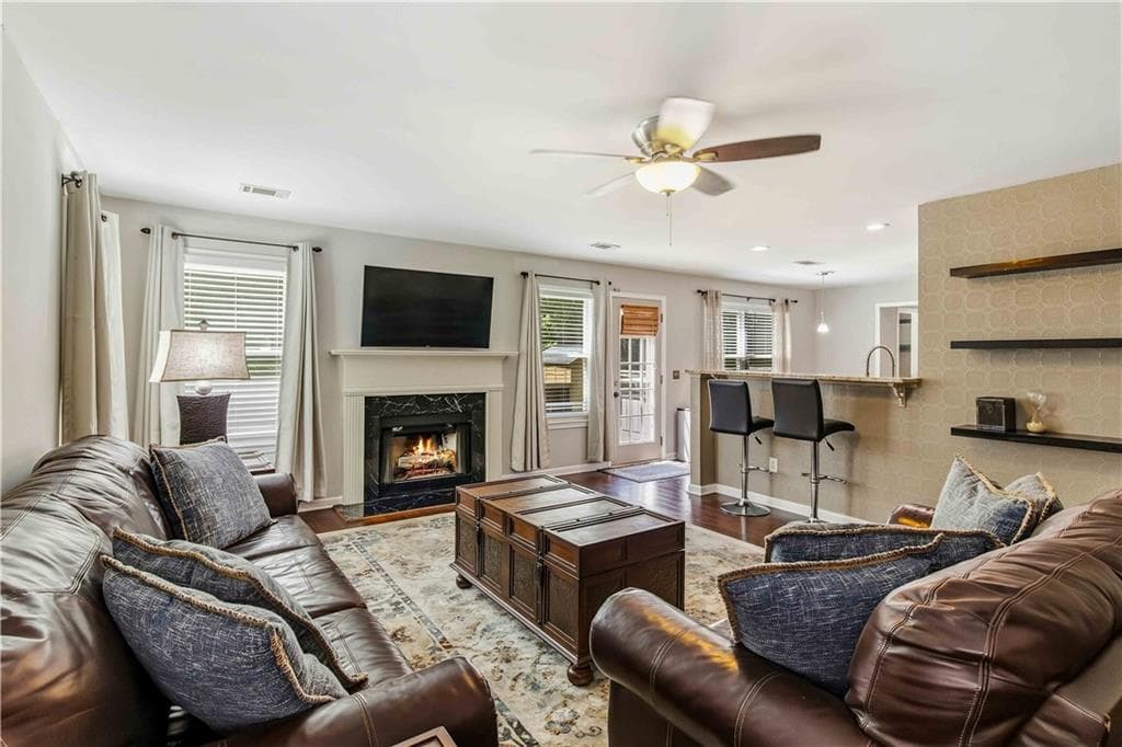 4 bedroom, 3 bathroom, 2,729 sq ft single family residence for sale at 5208 Silver Springs Drive, Sugar Hill, GA 30518 — photo 4