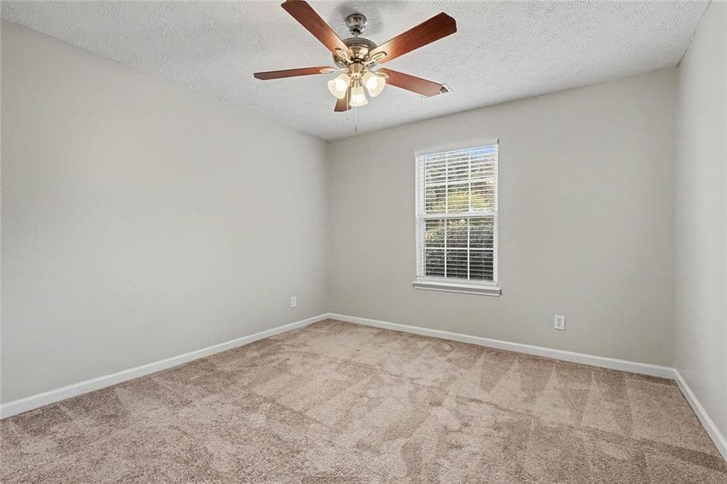 4 bedroom, 2 bathroom, 2,168 sq ft single family residence for sale at 411 Crested View Drive, Loganville, GA 30052 — photo 9