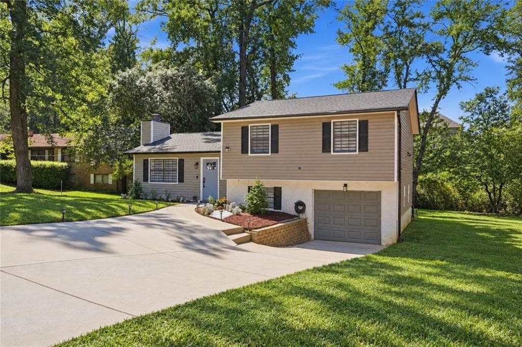 4 bedroom, 3 bathroom, 1,776 sq ft single family residence for sale at 3316 Alcazar Drive, Lilburn, GA 30047 — photo 4