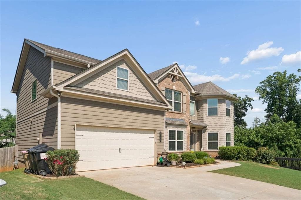 5 bedroom, 3 bathroom, 2,971 sq ft single family residence for sale at 5752 Shore Isle Court, Flowery Branch, GA 30542 — photo 2