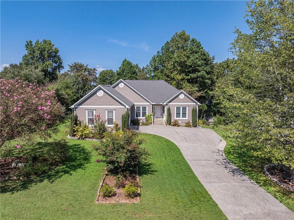 5 bedroom, 3 bathroom, 3,354 sq ft single family residence for sale at 2290 Black Bear Court, Buford, GA 30519 — photo 2