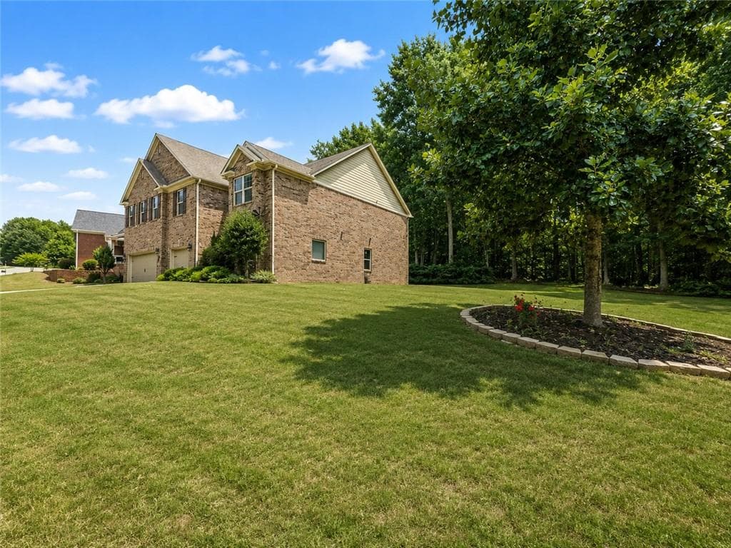 5 bedroom, 4 bathroom, 4,102 sq ft single family residence for sale at 2015 Chapel Estates Lane, Dacula, GA 30019 — photo 9