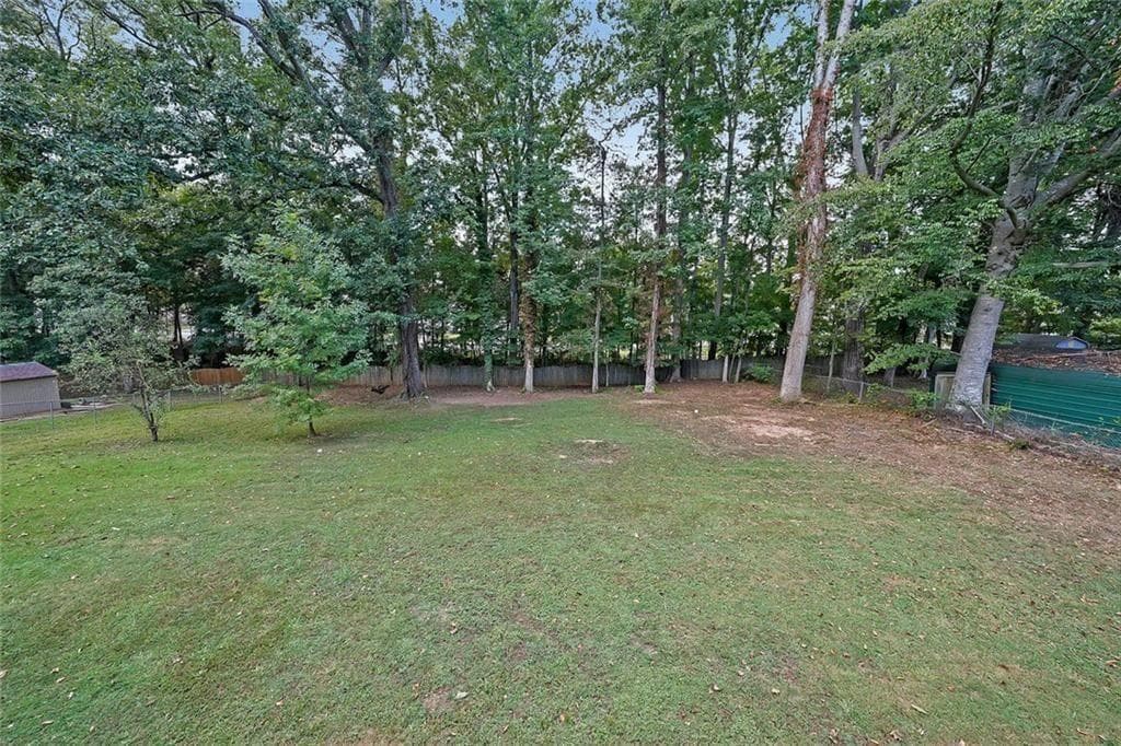 5 bedroom, 3 bathroom, 1,632 sq ft single family residence for sale at 773 Rebecca Street, Lilburn, GA 30047 — photo 2