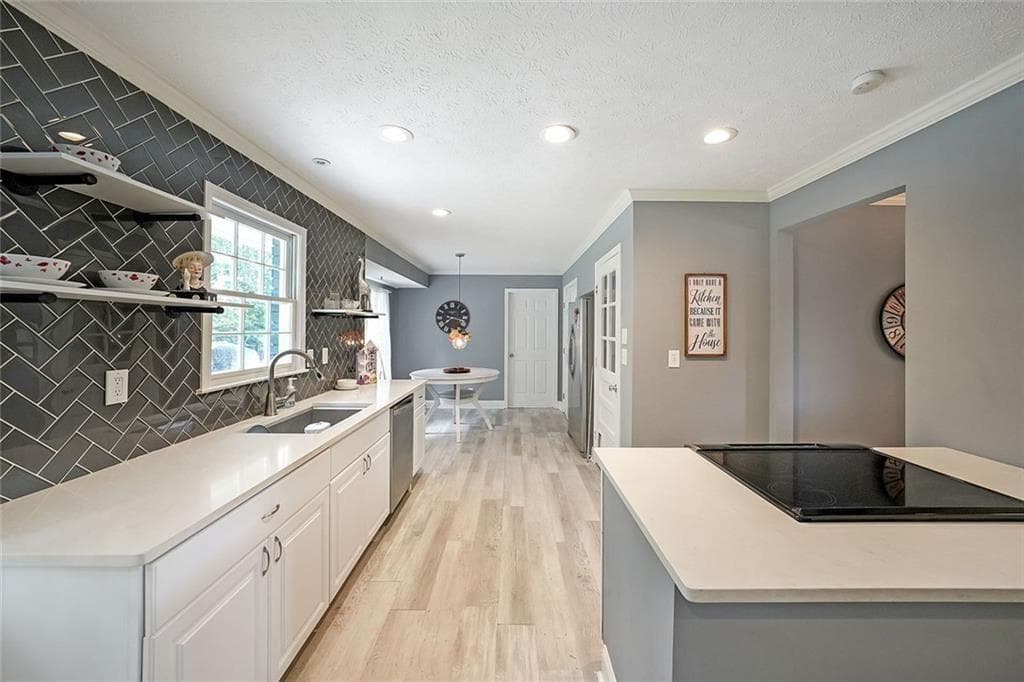 5 bedroom, 3 bathroom, 1,632 sq ft single family residence for sale at 773 Rebecca Street, Lilburn, GA 30047 — photo 4