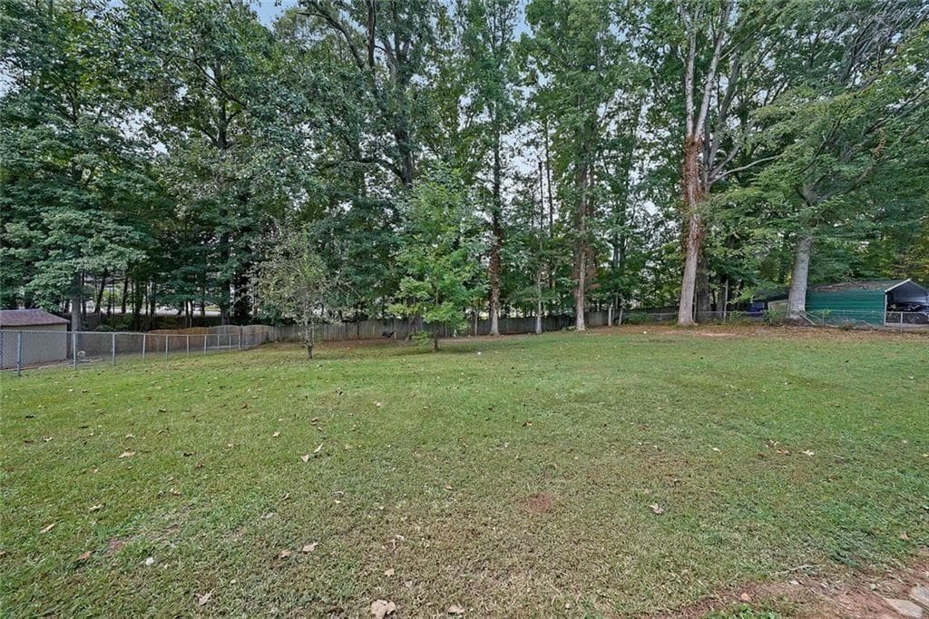 5 bedroom, 3 bathroom, 1,632 sq ft single family residence for sale at 773 Rebecca Street, Lilburn, GA 30047 — photo 6