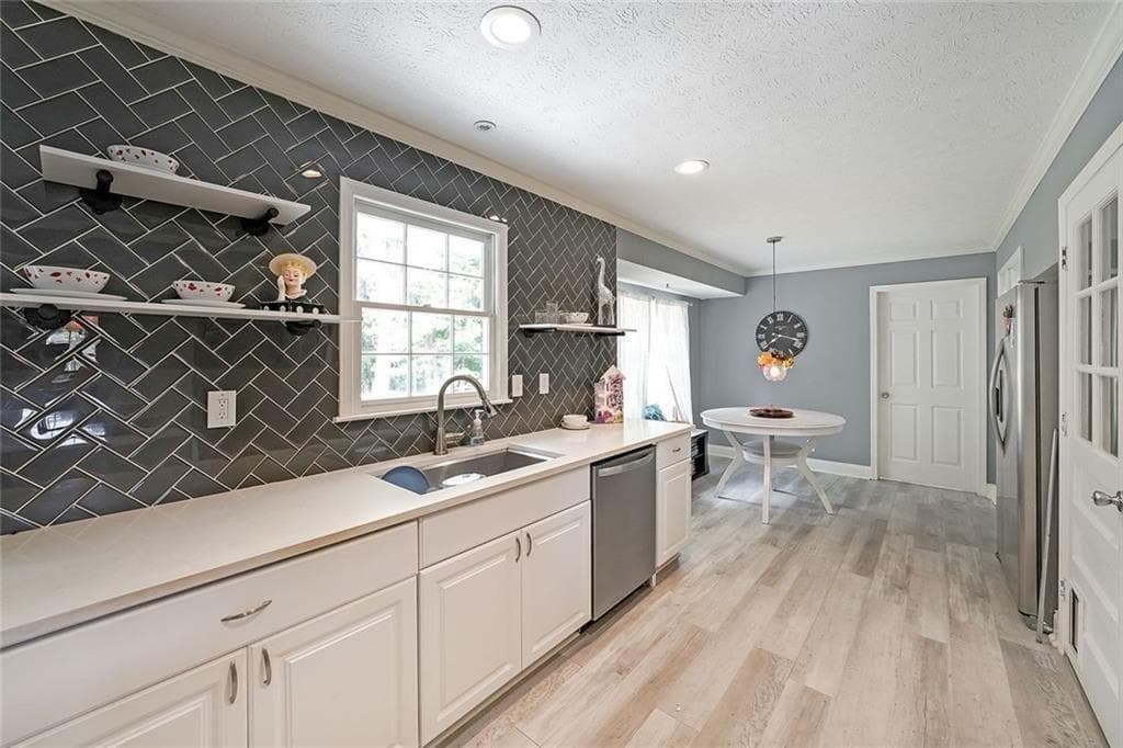 5 bedroom, 3 bathroom, 1,632 sq ft single family residence for sale at 773 Rebecca Street, Lilburn, GA 30047 — photo 9