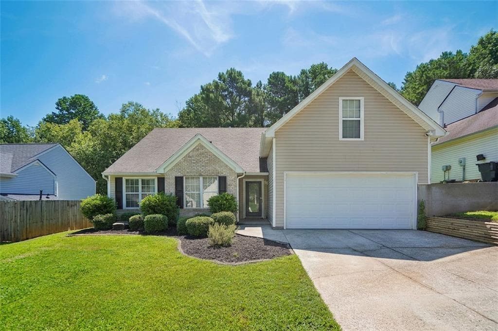 4 bedroom, 2 bathroom, 1,639 sq ft single family residence for sale at 1077 Woodsong Pass Court, Lawrenceville, GA 30043 — photo 1 of 36