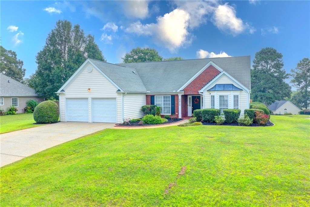 3 bedroom, 2 bathroom, 2,190 sq ft single family residence for sale at 5810 Tallantworth Crossing, Cumming, GA 30040 — photo 4