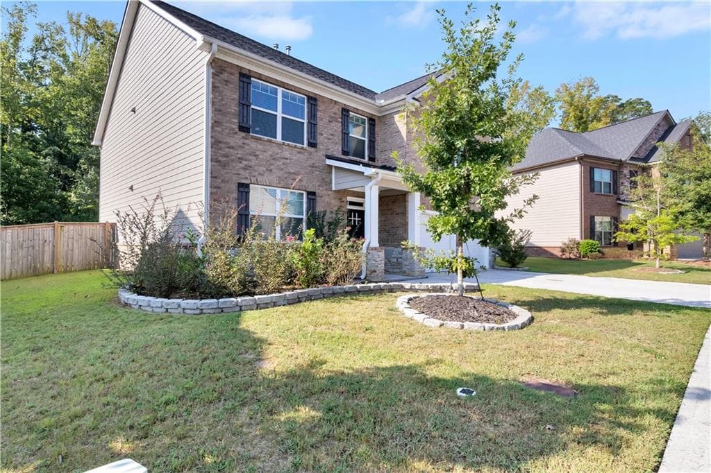 5 bedroom, 4 bathroom single family residence for sale at 3152 Hawthorn Farm Boulevard, Loganville, GA 30052 — photo 2