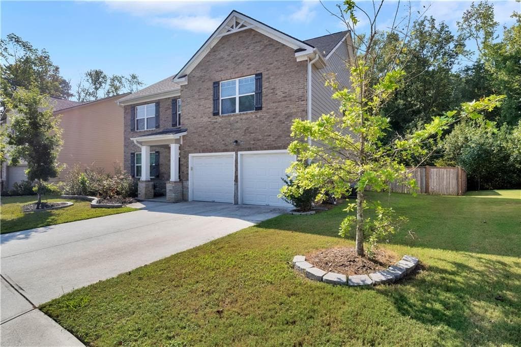 5 bedroom, 4 bathroom single family residence for sale at 3152 Hawthorn Farm Boulevard, Loganville, GA 30052 — photo 3
