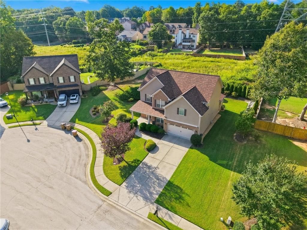 5 bedroom, 3 bathroom, 3,020 sq ft single family residence for sale at 2244 Mayors Way, Buford, GA 30519 — photo 2