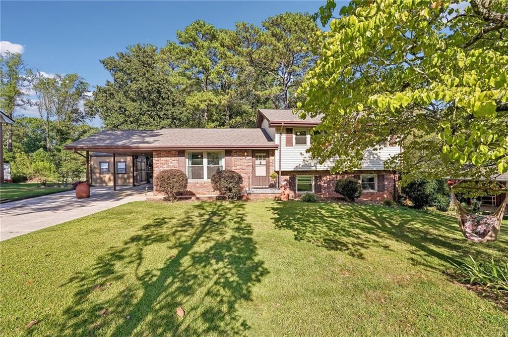 4 bedroom, 2 bathroom, 1,875 sq ft home for sale at 1933 Carthage Road, Tucker, GA