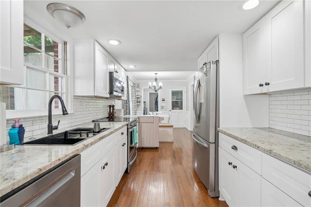 4 bedroom, 3 bathroom, 3,804 sq ft single family residence for sale at 585 James Street, Lilburn, GA 30047 — photo 9