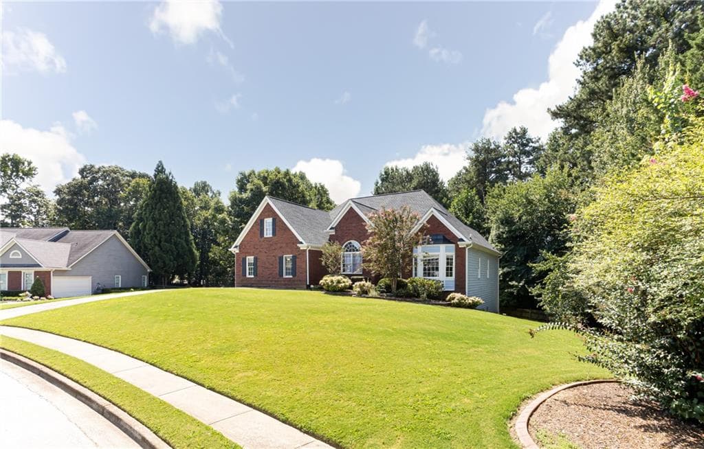 4 bedroom, 3 bathroom, 4,195 sq ft single family residence for sale at 4530 Bogan Gates Drive, Buford, GA 30519 — photo 3