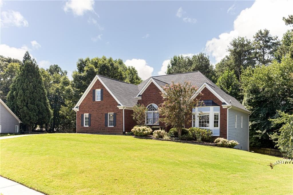 4 bedroom, 3 bathroom, 4,195 sq ft single family residence for sale at 4530 Bogan Gates Drive, Buford, GA 30519 — photo 4