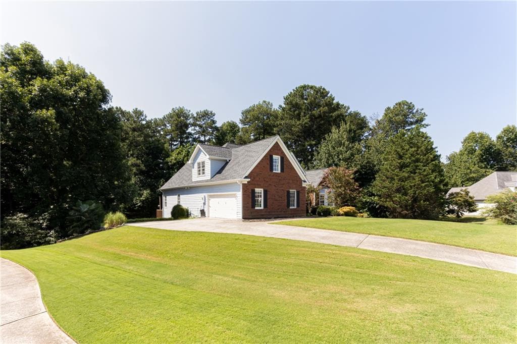 4 bedroom, 3 bathroom, 4,195 sq ft single family residence for sale at 4530 Bogan Gates Drive, Buford, GA 30519 — photo 5