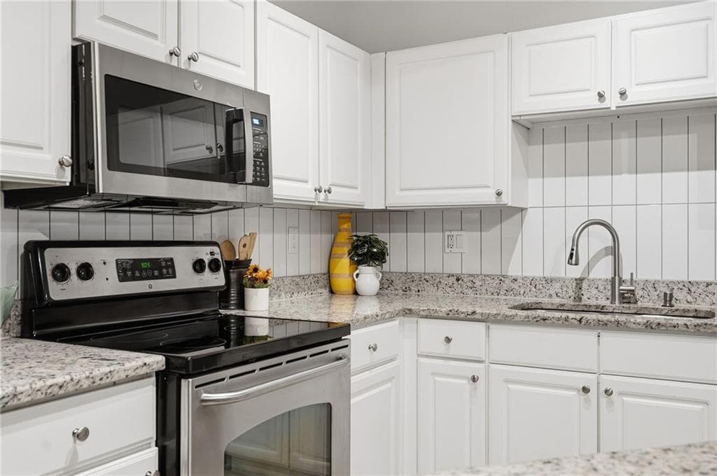 1 bedroom, 1 bathroom, 816 sq ft condominium for sale at 1850 Cotillion Drive 2111, Atlanta, GA 30338 — photo 5