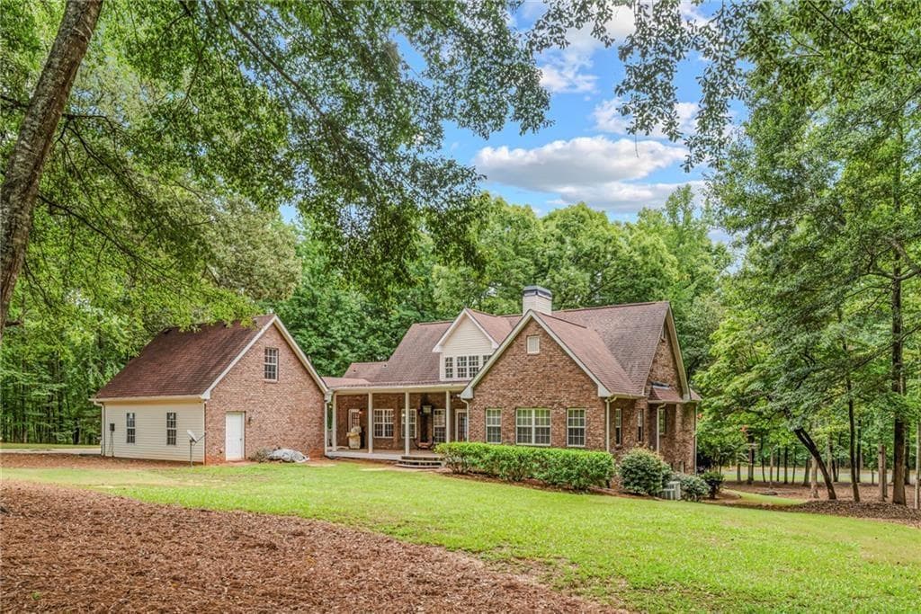 6 bedroom, 3 bathroom, 4,280 sq ft single family residence for sale at 170 St Gabriel Way, Fayetteville, GA 30215 — photo 4