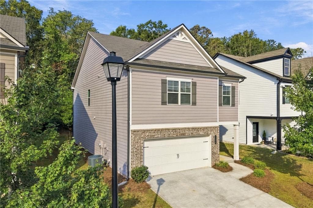 4 bedroom, 3 bathroom, 2,423 sq ft single family residence for sale at 3184 Hawthorne Path, Braselton, GA 30517 — photo 3