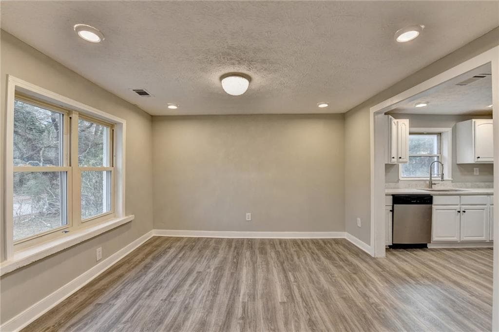 4 bedroom, 3 bathroom, 1,715 sq ft single family residence for sale at 574 Glendale Road, Scottdale, GA 30079 — photo 7