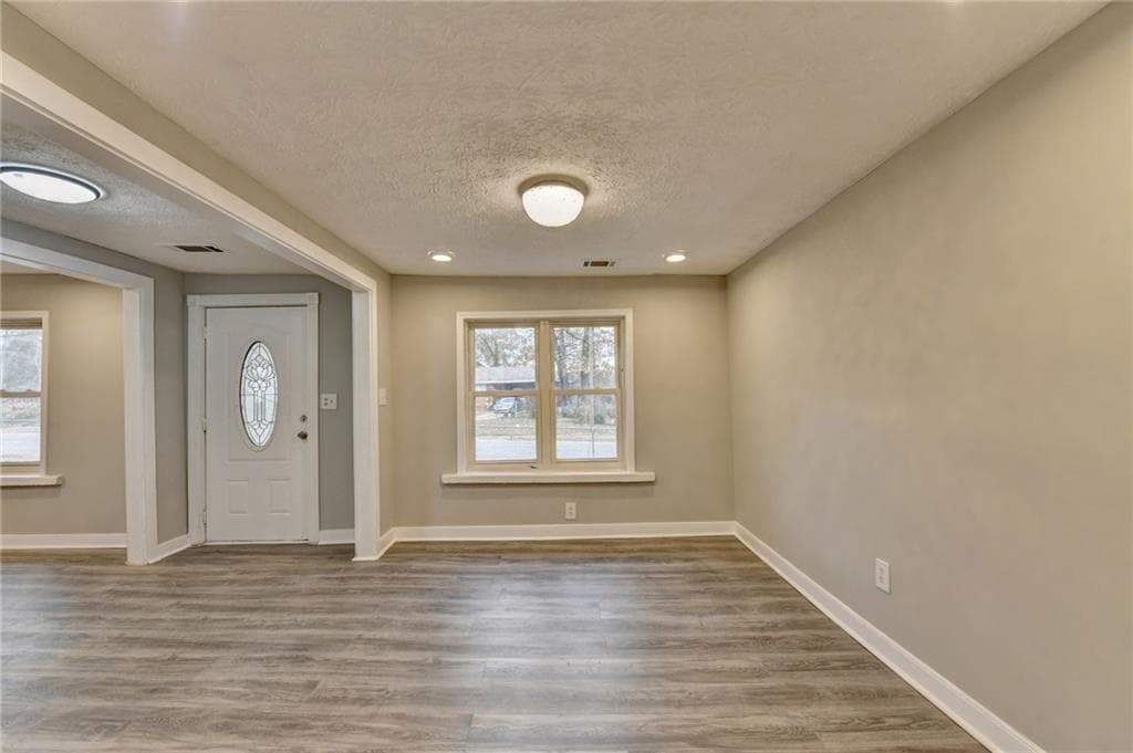 4 bedroom, 3 bathroom, 1,715 sq ft single family residence for sale at 574 Glendale Road, Scottdale, GA 30079 — photo 8