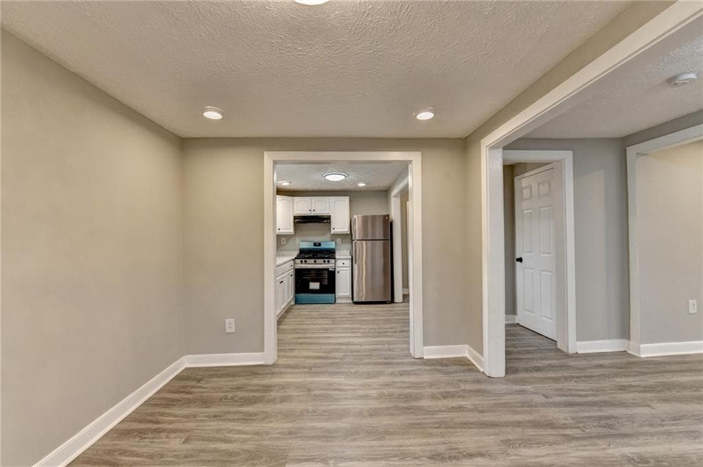 4 bedroom, 3 bathroom, 1,715 sq ft single family residence for sale at 574 Glendale Road, Scottdale, GA 30079 — photo 9