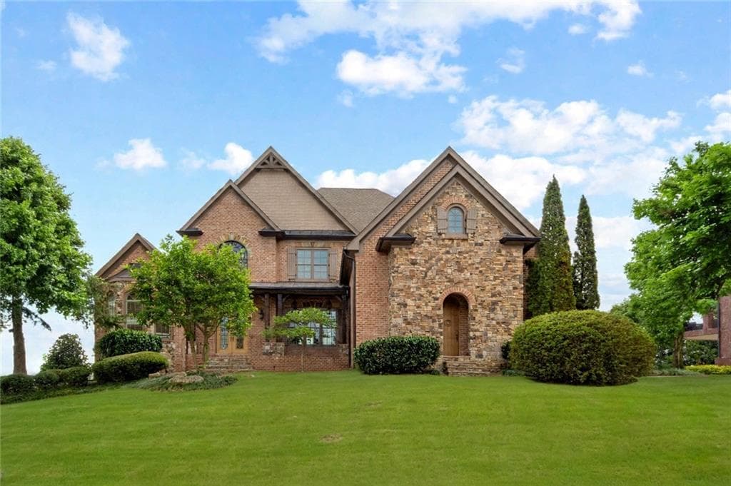 6 bedroom, 7 bathroom, 8,915 sq ft single family residence for sale at 2613 Northern Oak Drive, Braselton, GA 30517