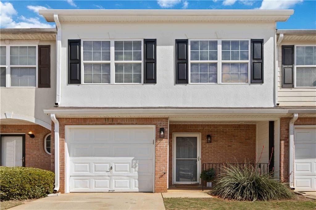 3 bedroom, 3 bathroom, 1,568 sq ft townhouse for sale at 702 Georgetown Court, Jonesboro, GA 30236 — photo 1 of 29