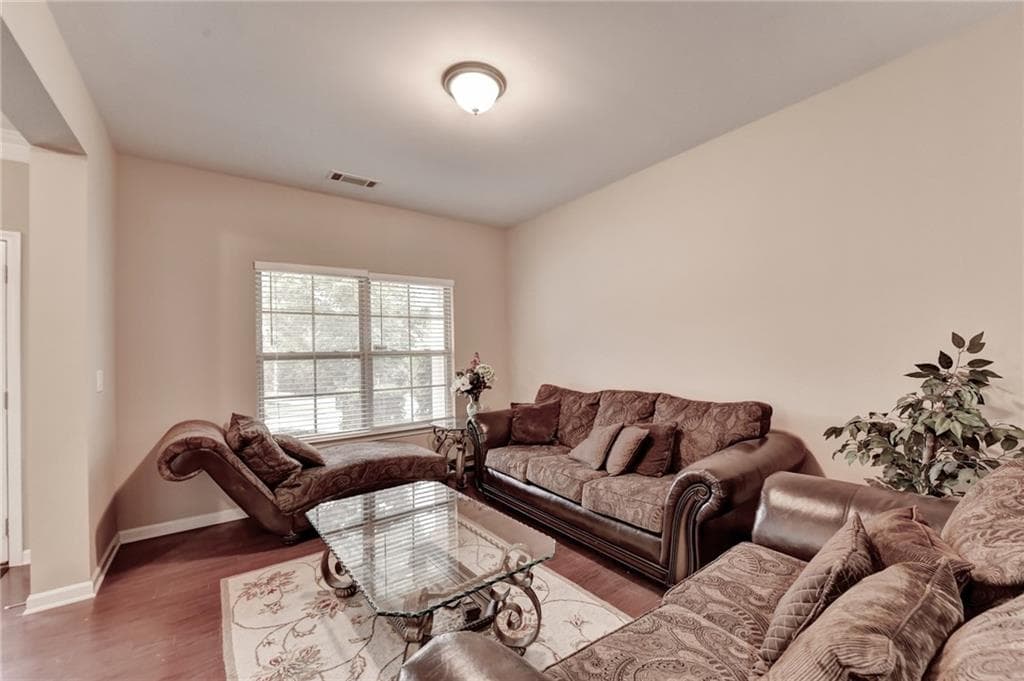 5 bedroom, 4 bathroom, 3,356 sq ft single family residence for sale at 4228 Woods Creek Lane, Suwanee, GA 30024 — photo 4