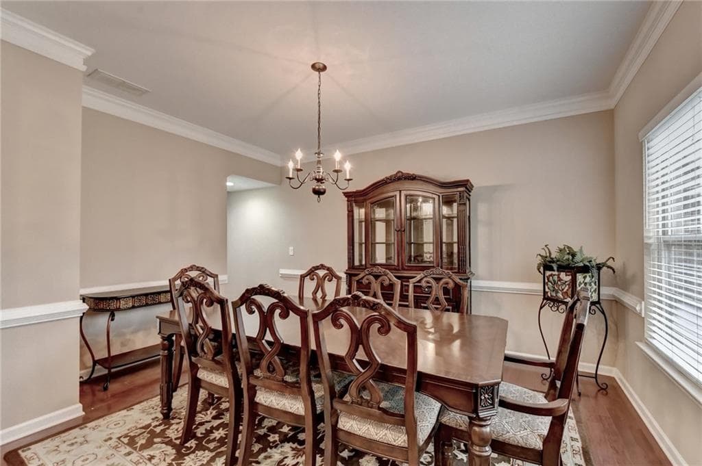 5 bedroom, 4 bathroom, 3,356 sq ft single family residence for sale at 4228 Woods Creek Lane, Suwanee, GA 30024 — photo 5