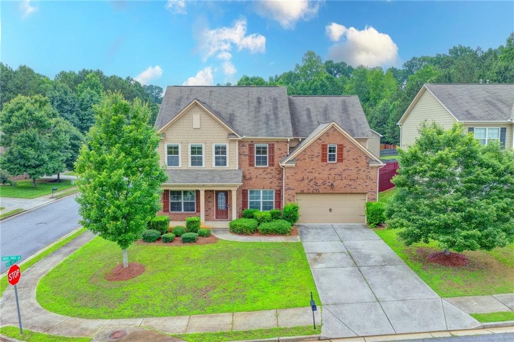 5 bedroom, 4 bathroom, 3,356 sq ft single family residence for sale at 4228 Woods Creek Lane, Suwanee, GA 30024 — photo 6