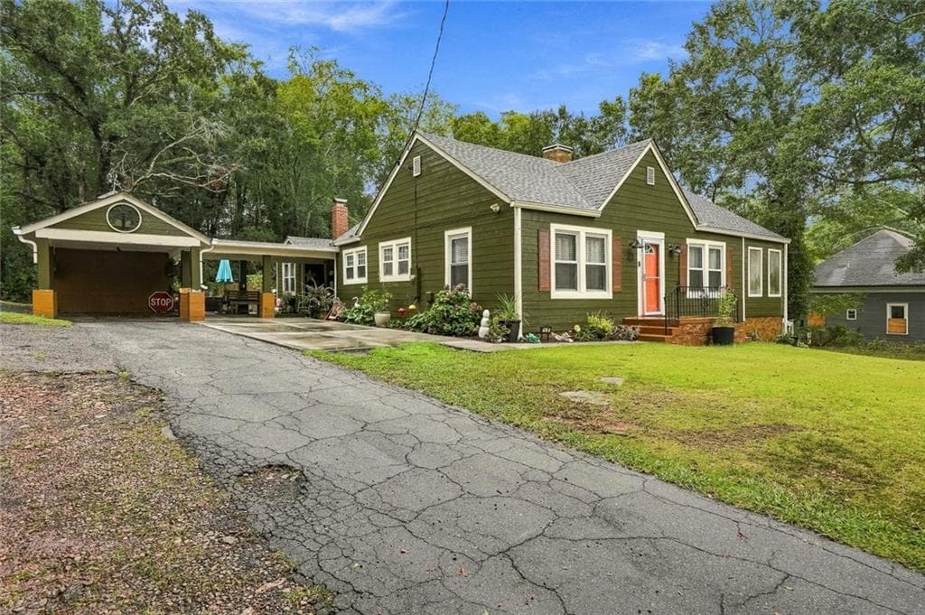 3 bedroom, 2 bathroom, 1,612 sq ft single family residence for sale at 2658 Rock Chapel Road, Lithonia, GA 30058 — photo 2