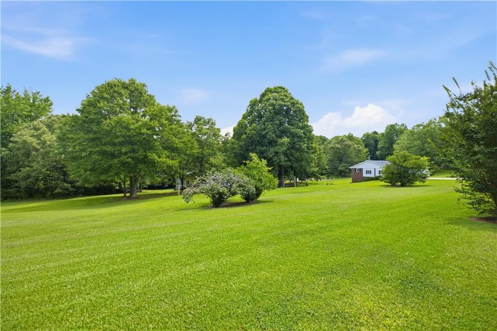 4 bedroom, 3 bathroom single family residence for sale at 1470 Jackson Drive, Cumming, GA 30040 — photo 2