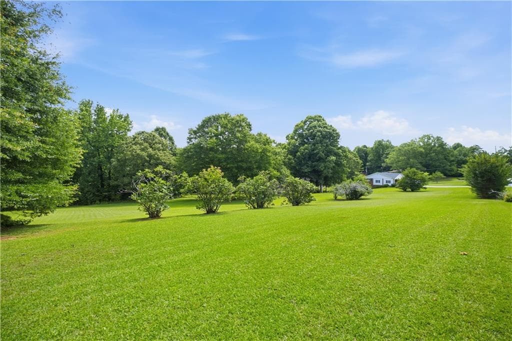 4 bedroom, 3 bathroom single family residence for sale at 1470 Jackson Drive, Cumming, GA 30040 — photo 4