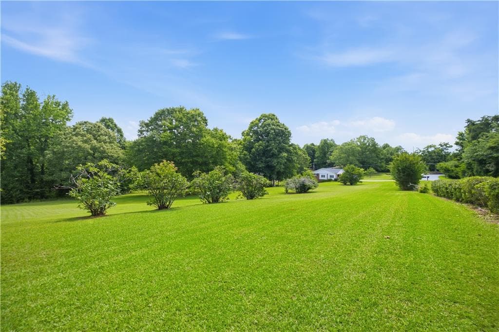 4 bedroom, 3 bathroom single family residence for sale at 1470 Jackson Drive, Cumming, GA 30040 — photo 5